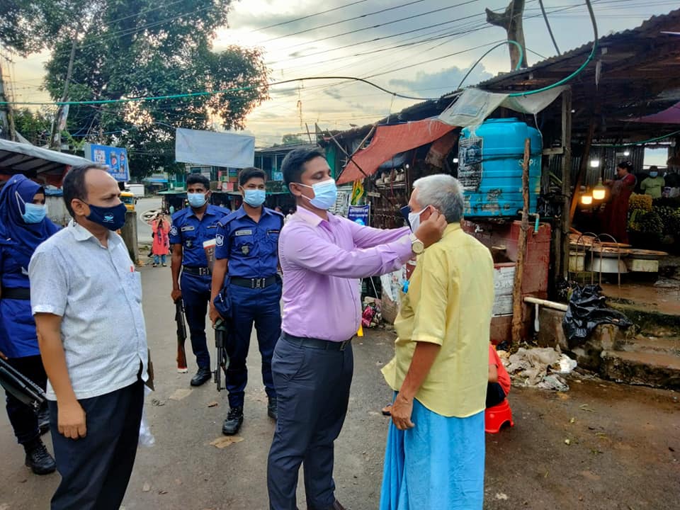 রাঙামাটি ভ্রাম্যমান আদালতের প্রচারণা ও মাস্ক বিতরণ